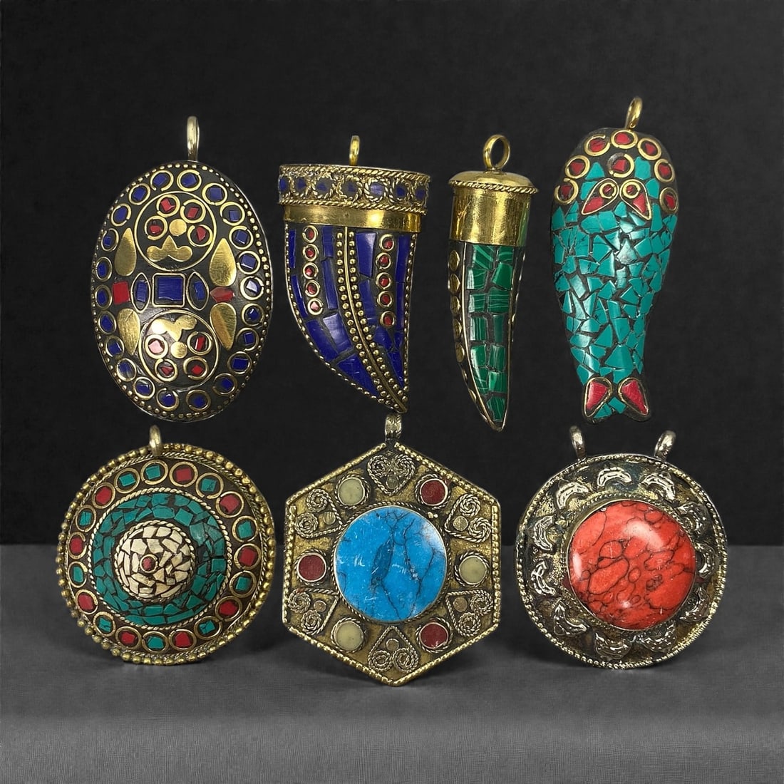 A Group of Seven Himalayan Gilt-Metal and Stone-Inset Pendants, 20th Century, 1XJ (1 of 2)