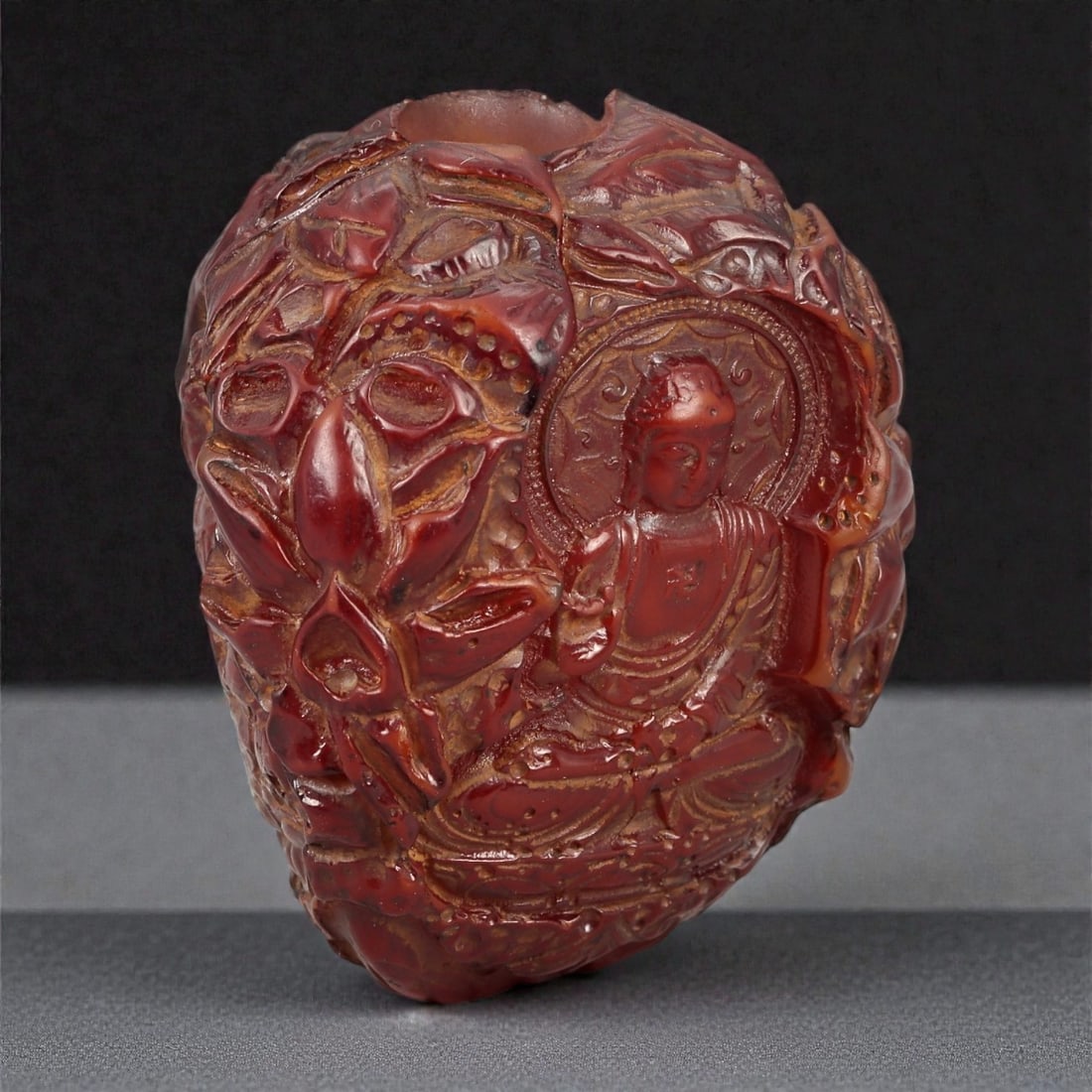 A Buddhist Amber-Resin Bead, 20th Century, 79FC (1 of 3)