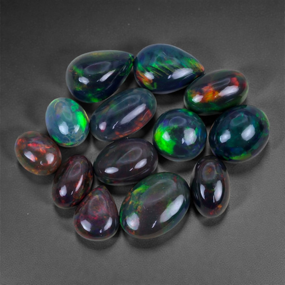 25 Carats of Ethiopian Welo Black Smoked Opal Cabochons, 52V (1 of 1)