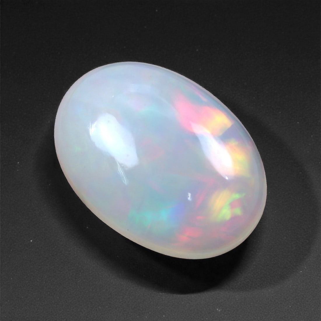 4.24 Carat Ethiopian Welo Opal - Oval Cabochon 14.2 x 10.2 x 6.4 mm, 31XH (1 of 2)