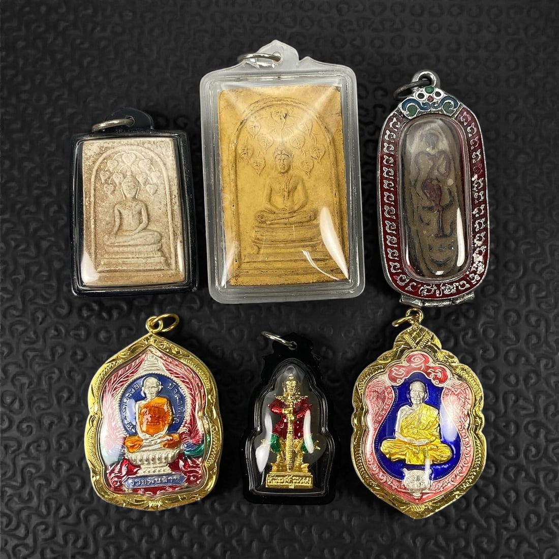 A Group of Six Thai Buddhist Amulets, 20th Century, 11XJ (1 of 2)