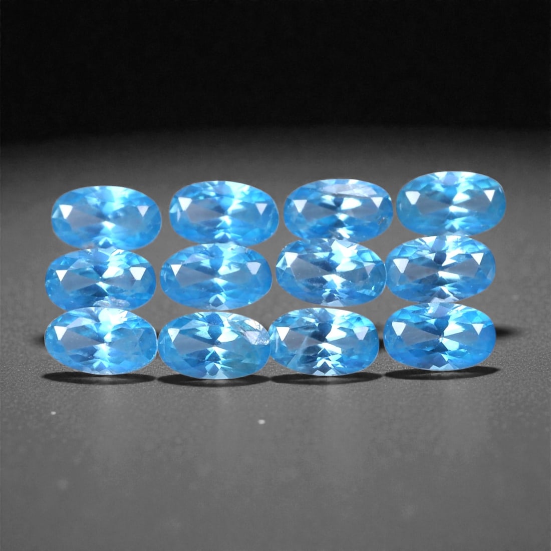 3.68 Carats Sky Blue Zircon Parcel - Natural Cambodian Stones, 4x2mm, 98XH: This finely calibrated parcel of blue zircon dazzles with crisp brilliance and a radiant sky blue tone. Each gem is precision-cut to maximize sparkle, with sharp faceting that creates vibrant flashes
