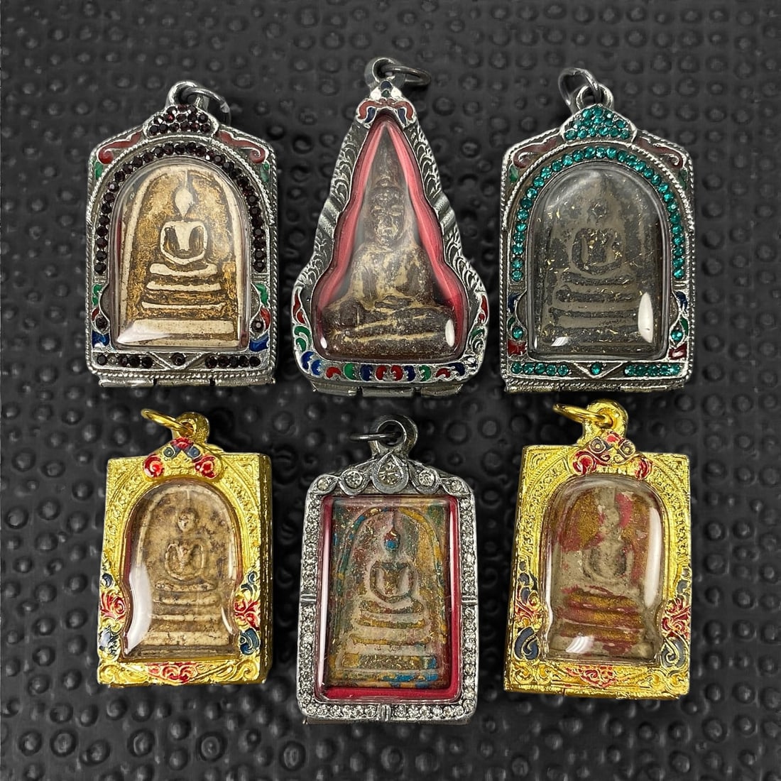 A Group of Six Thai Buddhist Amulets, 20th Century, 22XJ (1 of 2)