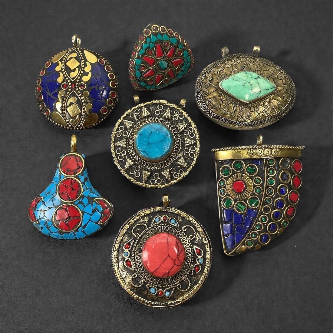 A Group of Seven Himalayan Gilt-Metal and Stone-Inset Pendants, 20th Century, 3XJ (1 of 2)