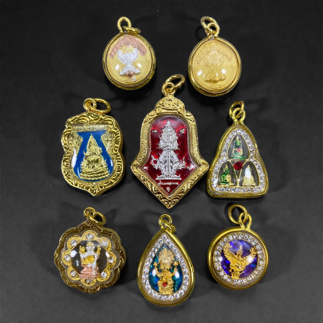 A Group of Eight Thai Amulets, 20th Century, 93W (1 of 1)
