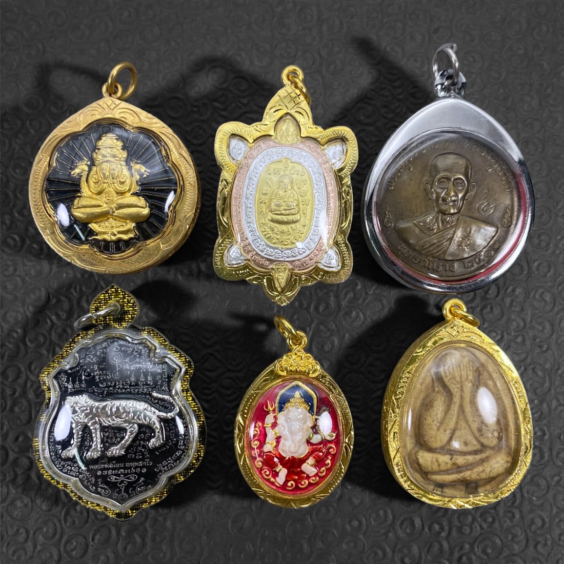 A Group of Six Thai Amulets, 20th Century, 39W (1 of 1)