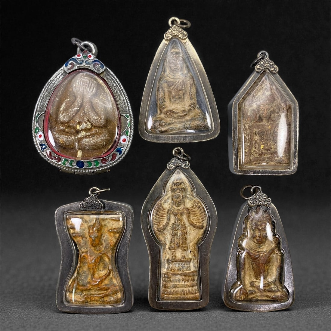 A Group of Six Thai Buddhist Votive Amulets, 20th Century, 100Z (1 of 1)