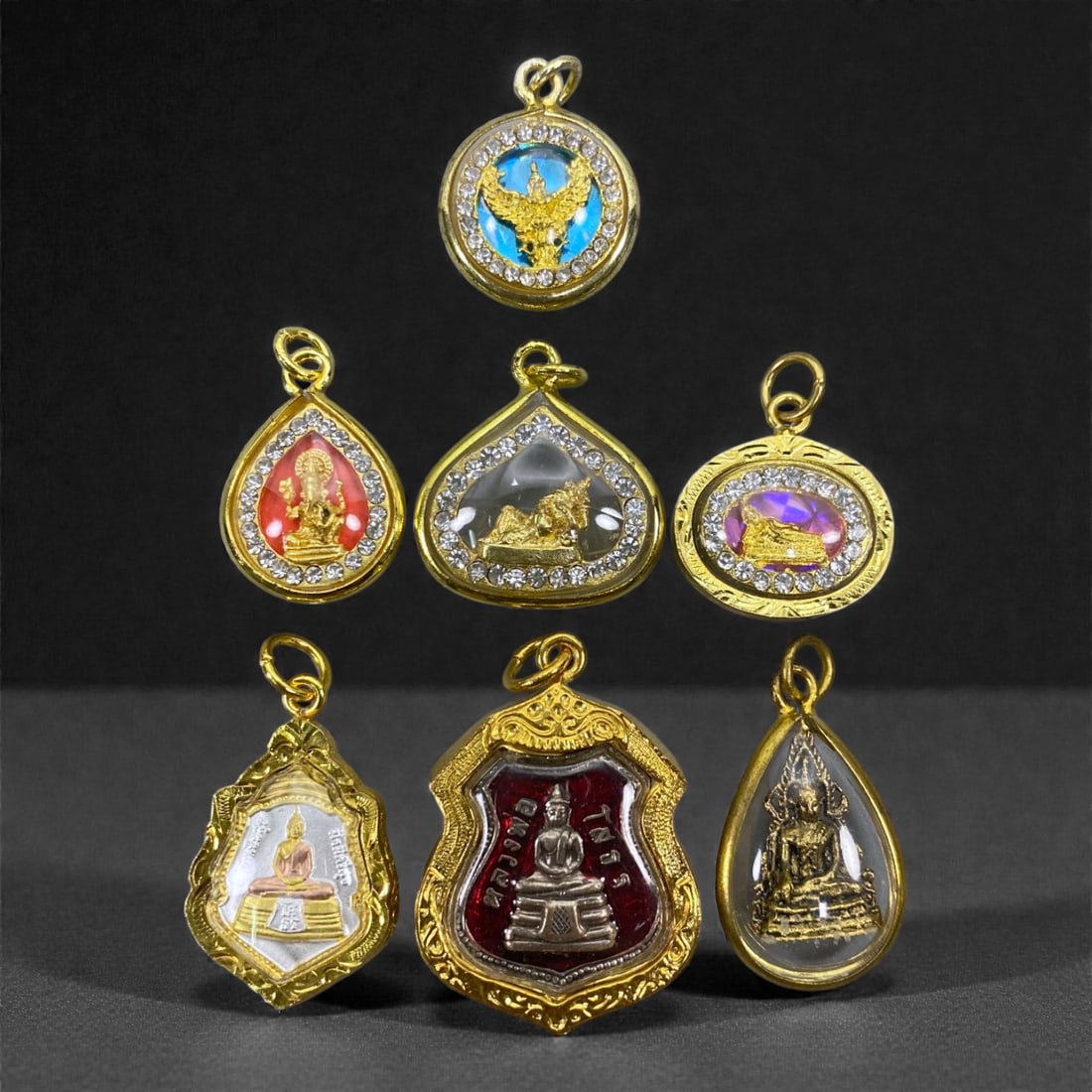 A Group of Seven Thai Amulets, 20th Century, 75V (1 of 1)