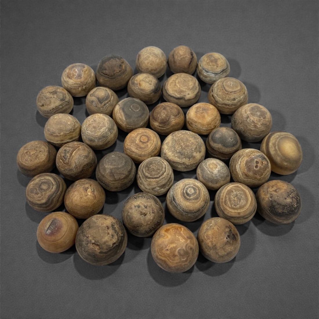 A Group of Tibetan Luk Mik ("Goat's Eye") Agate Beads, 19th-20th Century, 95W (1 of 1)