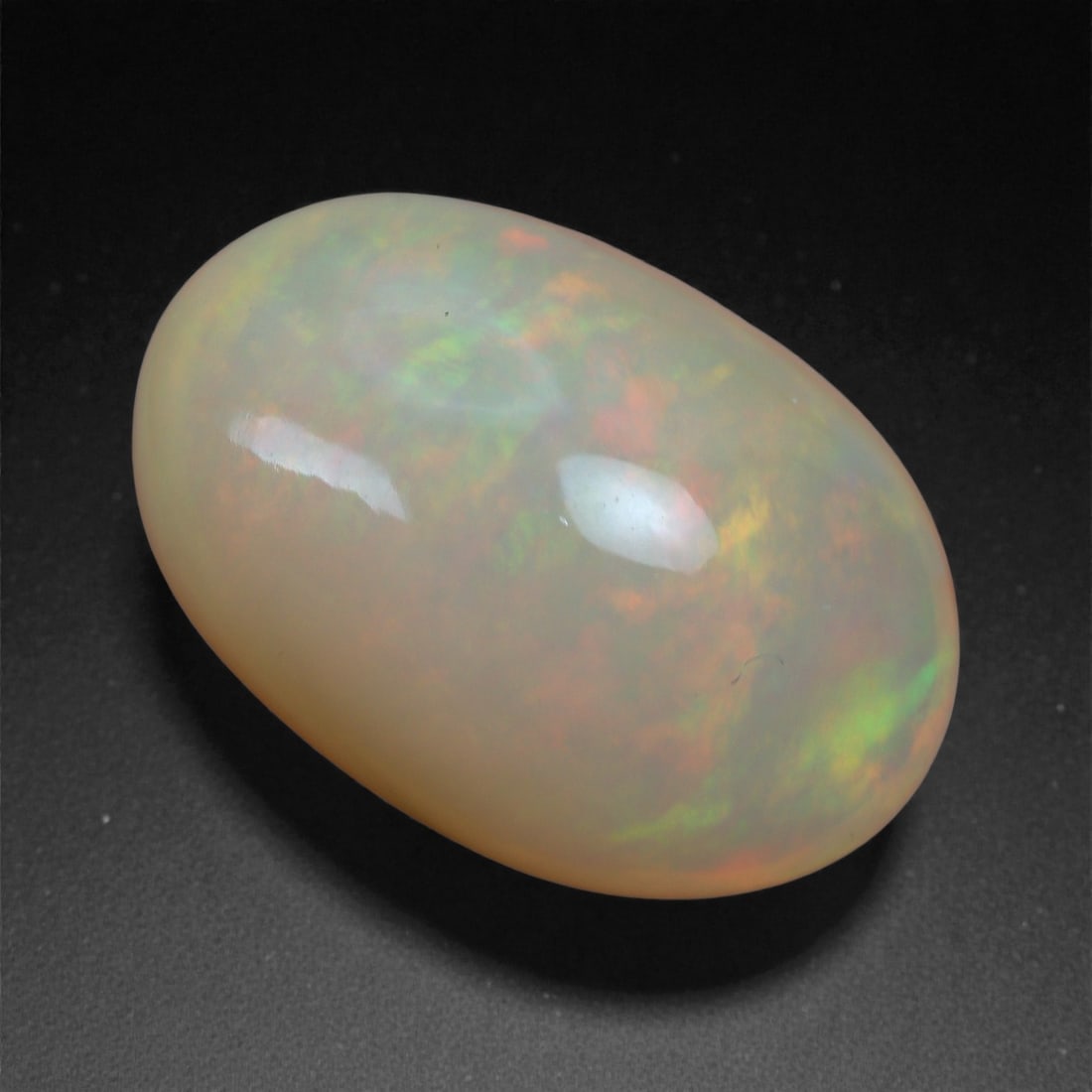 4.06 Carats Play-of-Color Welo Opal - Natural Ethiopian Gem 13x9mm, 49XA (1 of 2)