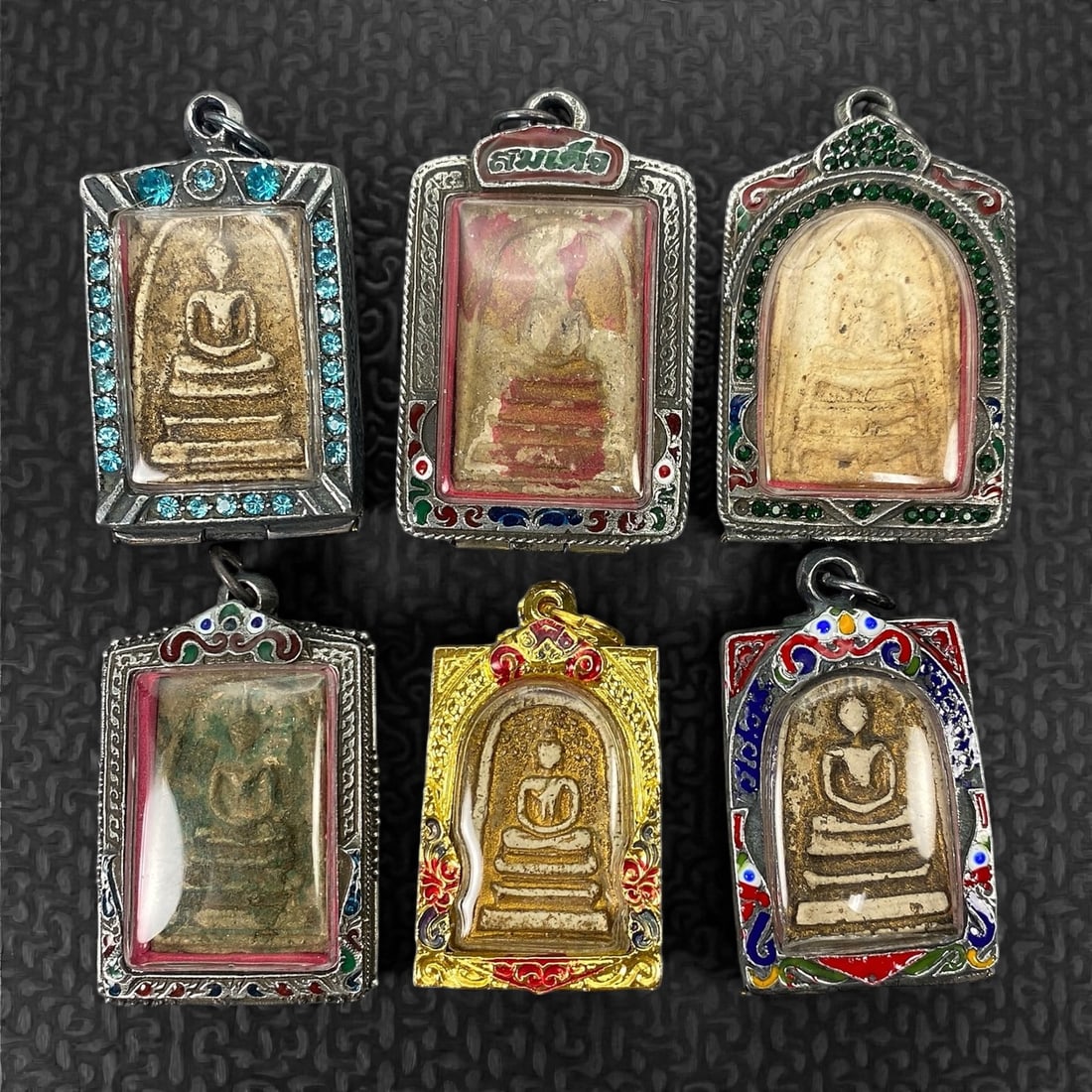 A Group of Six Thai Buddhist Amulets, 20th Century, 8XJ (1 of 2)