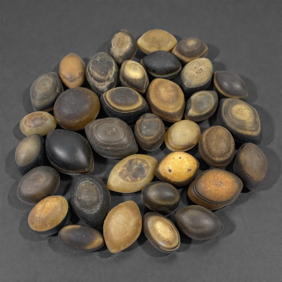 A Group of Tibetan Luk Mik ("Goat's Eye") Agate Beads, 11th-14th Century CE, 42W (1 of 1)