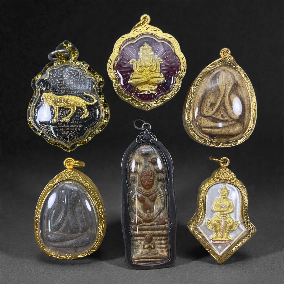 A Group of Six Thai Amulets, 20th Century, 37W (1 of 1)