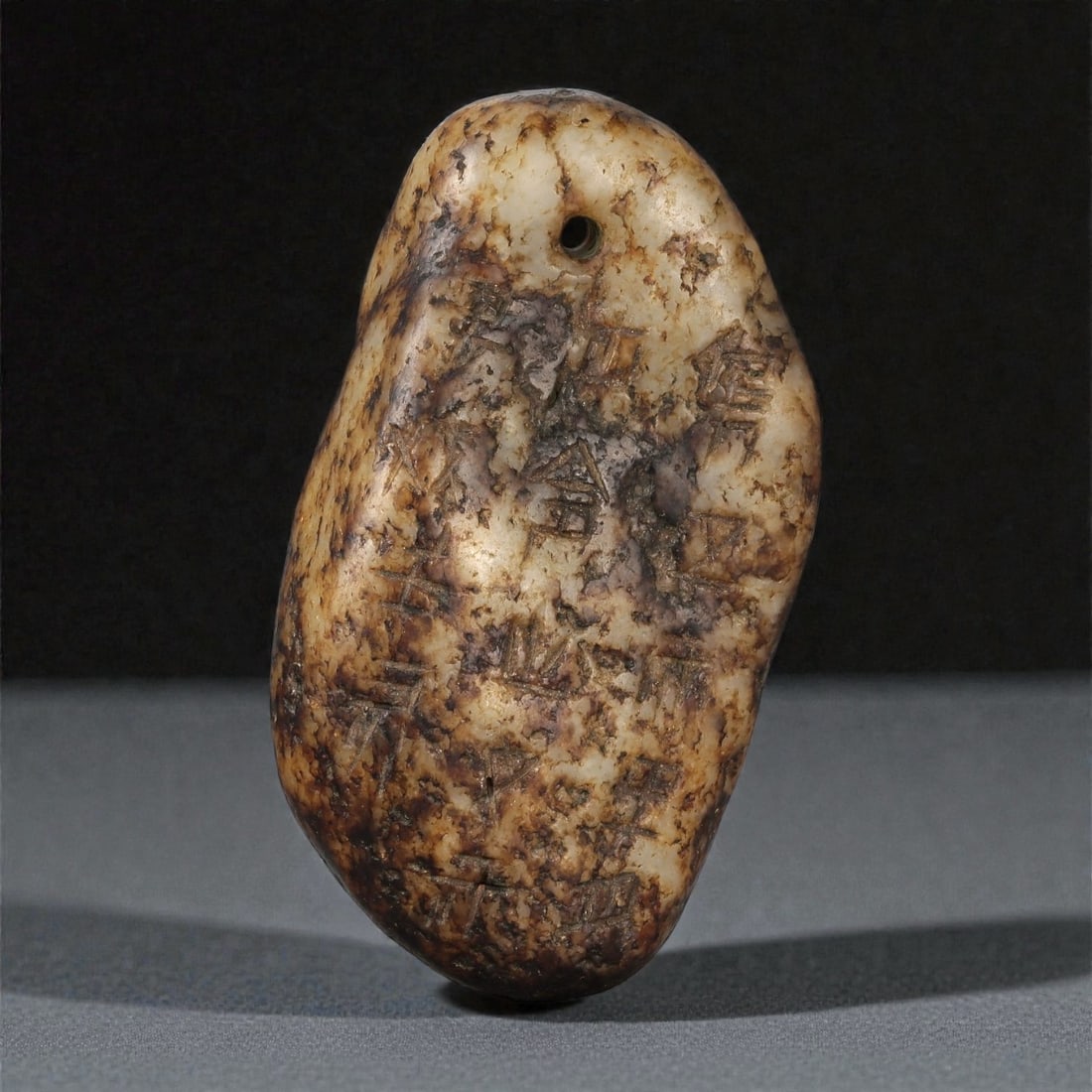 A Chinese Nephrite Jade Pebble with Incised Calligraphy, Late Qing-Republic Period, 84FC (1 of 2)
