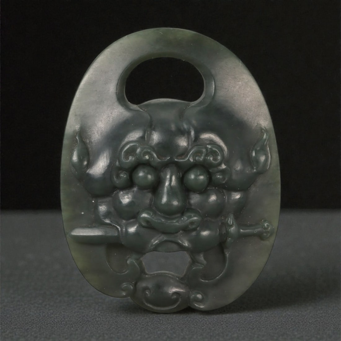A Chinese Nephrite Jade Mask Pendant, 20th Century, 98FB (1 of 2)