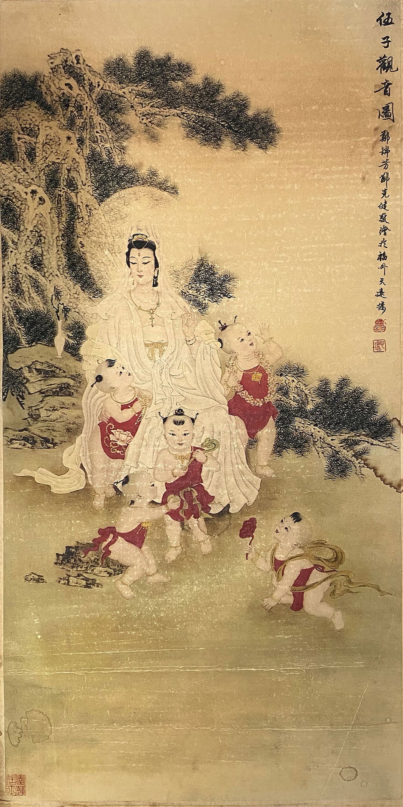 A Chinese Ink and Color Art Print of Guanyin with Five Children, 20th Century, 18FK: Produced using fine art printing processes on aged paper stock, the work is an ink and color art print depicting the Buddhist bodhisattva Guanyin seated in a rocky, pine-framed landscape, surrounded b