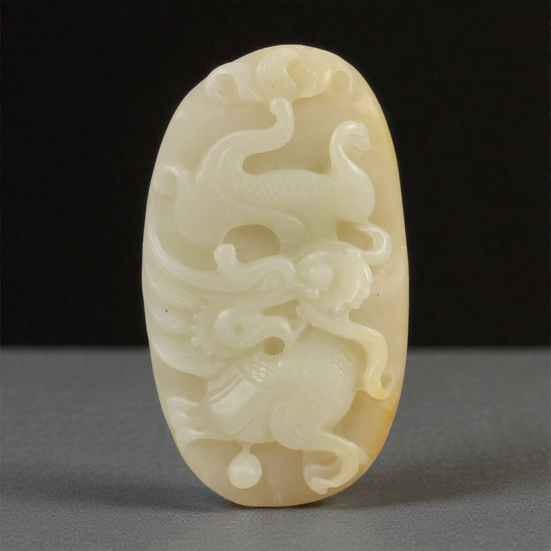 A Chinese Hetian Jade Qilin Relief Plaque, 20th Century, 50YA (1 of 2)