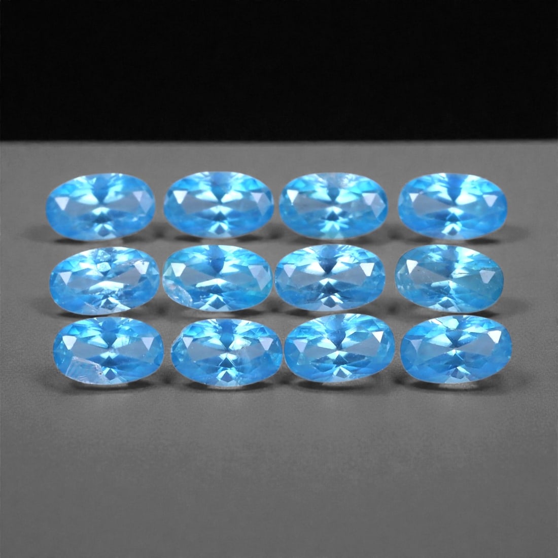 3.79 Carats Electric Sky Blue Zircon Parcel - Natural Cambodian Stones, 5x3mm, 99XH: This radiant parcel of blue zircon dazzles with exceptional brilliance and a vibrant sky blue hue. Each stone is expertly faceted to create sharp, mirror-like flashes and strong internal reflections,