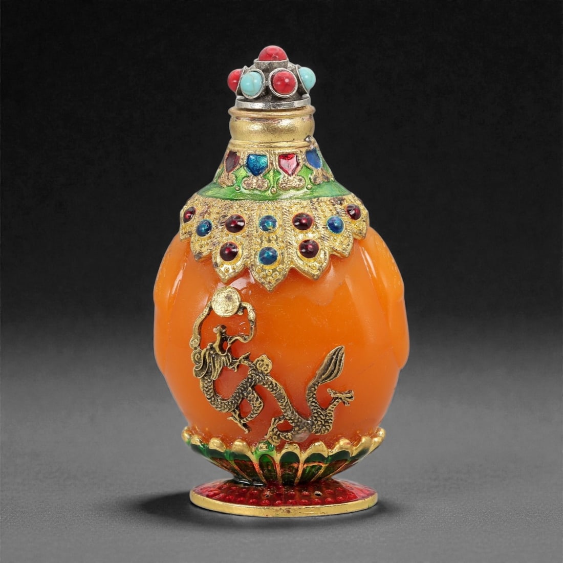 A Chinese Amber-Coloured Resin and Brass Snuff Bottle, 20th Century, 15FG (1 of 3)