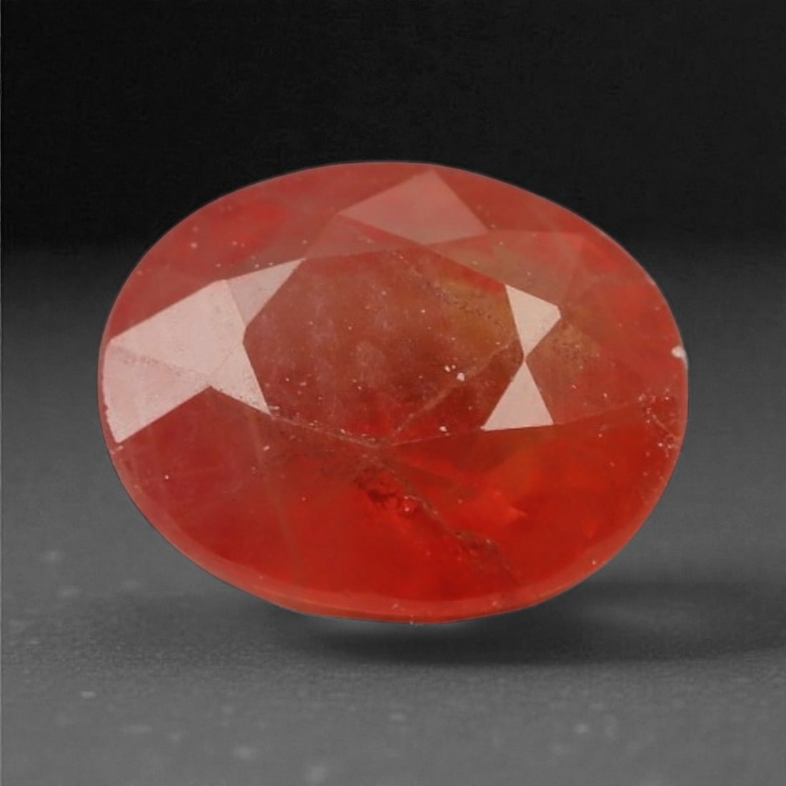1.04 Carats Fiery Orange Sapphire - Natural Ceylon Stone - 6.2 x 5.2 x 3.2 mm, 39XK: This bold orange sapphire radiates with a glowing ember-like hue, capturing the eye with its rich saturation and warm internal light. The oval cut enhances its body color and adds gentle sparkle acros