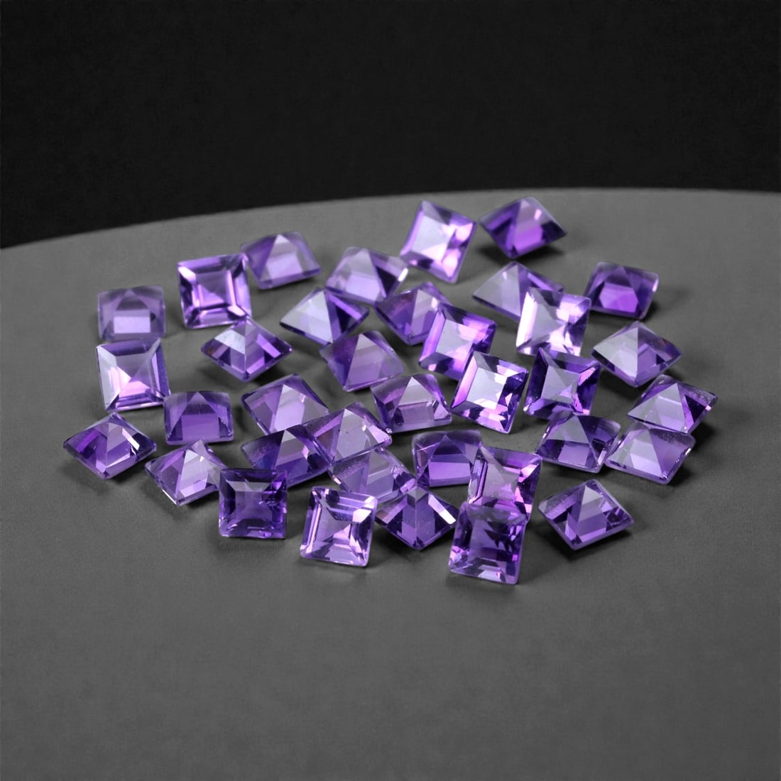 3.48 Carats Royal Purple Amethyst Parcel - Natural Brazilian Stones, 2.7x2.0mm, 89XH: This precision-cut parcel of amethyst features lively square shapes in a vibrant medium-to-deep purple tone, with flashes of magenta and lilac under direct light. Each gem is sharply faceted to delive