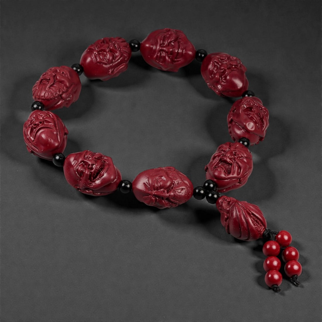 A Chinese Cinnabar Carved Bead Bracelet, 20th Century, 49FD (1 of 1)