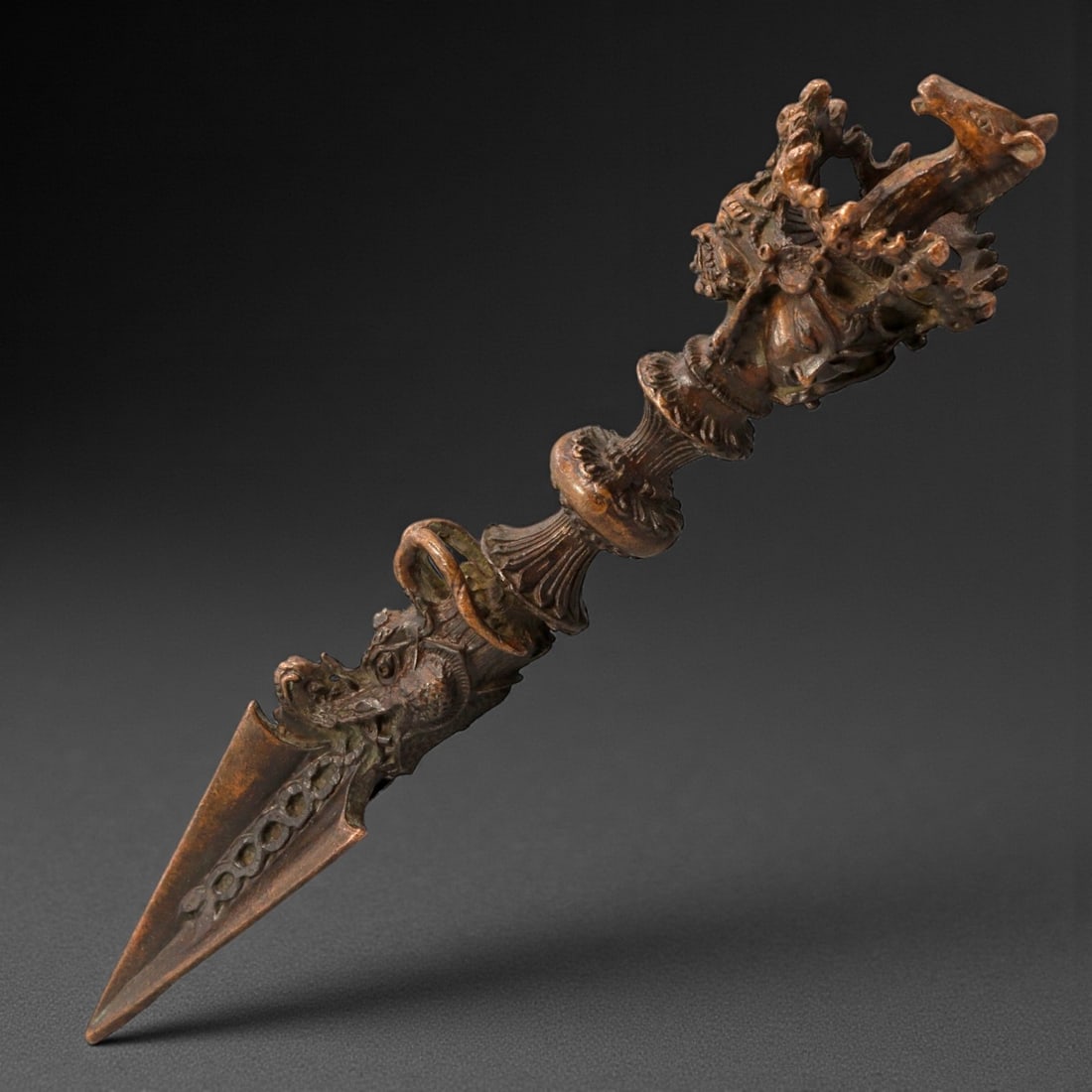 A Tibetan Bronze Ritual Dagger (Phurba), 20th Century, 91YC (1 of 2)