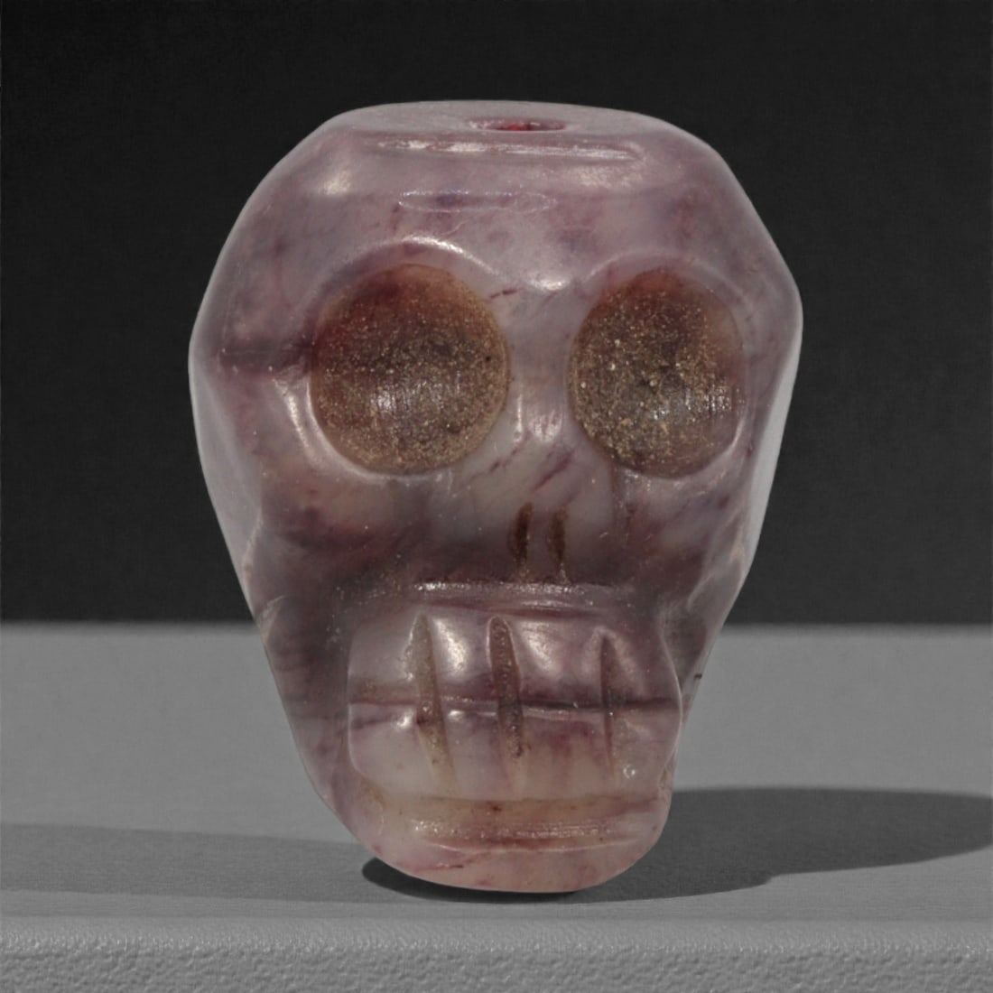 A Tibetan Stone Skeleton Bead, Mid-20th Century, 66FJ (1 of 2)