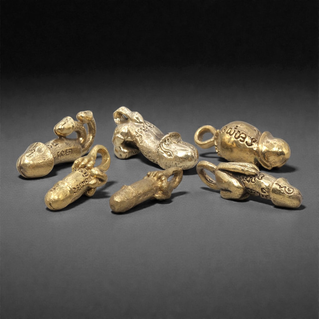 A Group of Thai Copper Alloy Phallic Amulets (Palad Khik), 20th Century, 6ZG (1 of 1)