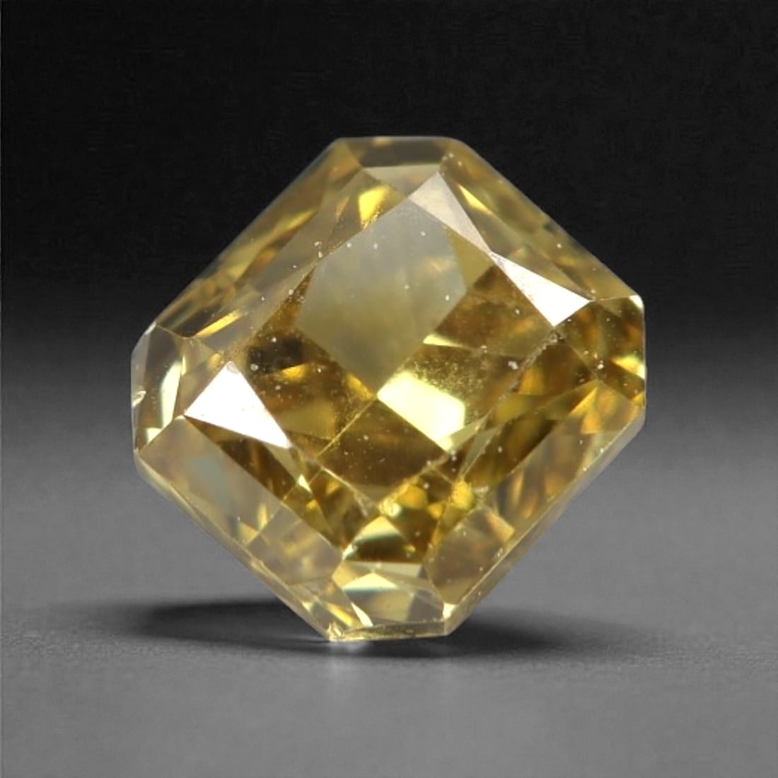 0.29 Carats Fancy Light Yellow Diamond - Natural South African Origin, 3DA: This 0.29 carat fancy light yellow diamond glows with a soft, buttery hue reminiscent of sun-warmed honey, its radiant octagonal cut amplifying a luminous, lively sparkle across every precisely polish
