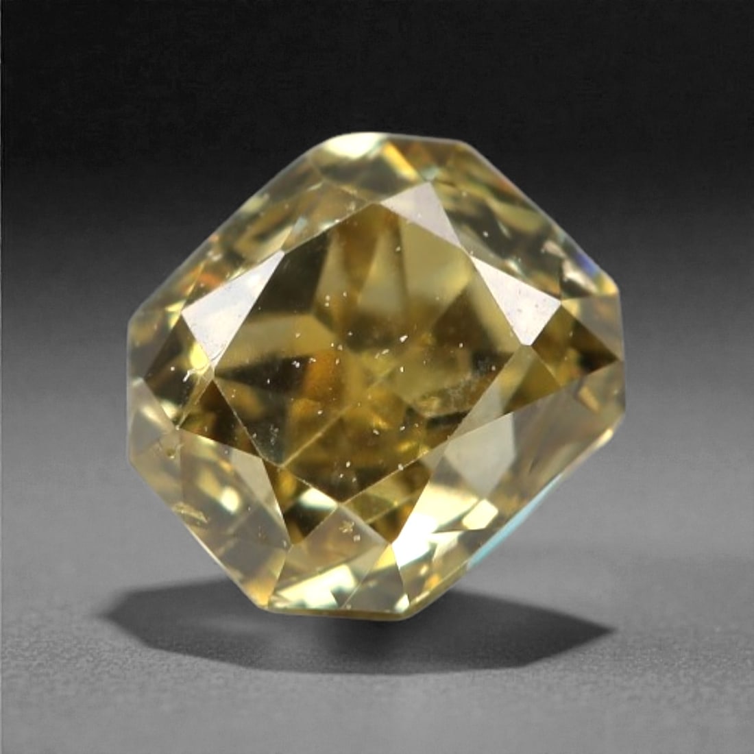0.28 Carats Fancy Light Yellow Diamond - Natural South African Origin, 14DA: This 0.28 carat fancy light yellow diamond glows with a soft, buttery hue reminiscent of sun-warmed honey, its radiant octagonal cut amplifying a luminous, lively sparkle across every precisely polish