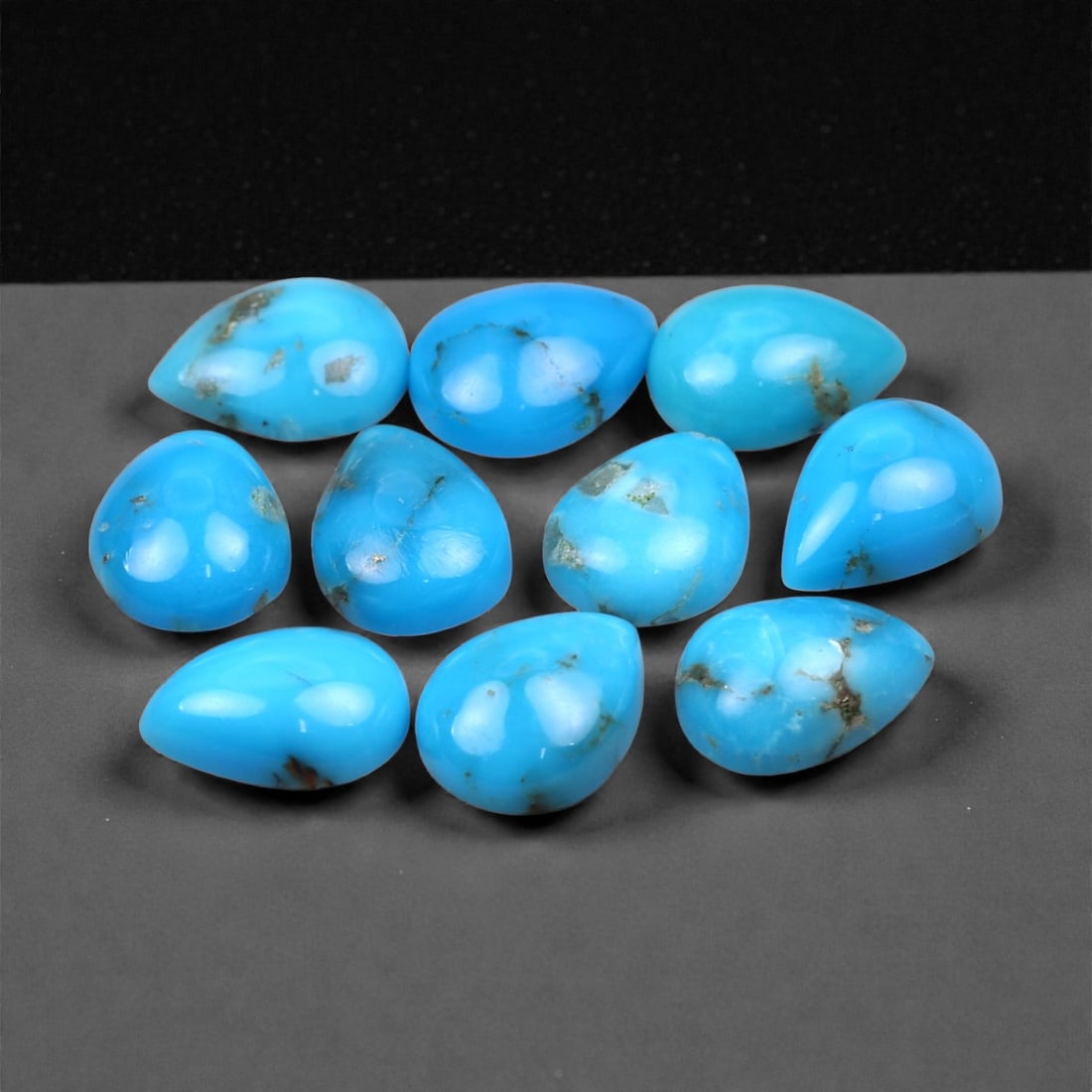 9.11 Carats Vivid Sky Blue Turquoise Parcel - Natural Loose Stones, 8x6mm, 92XH: This eye-catching parcel of turquoise displays a rich sky blue color with natural matrix patterns that enhance each stone's individuality. The saturation is vibrant and uniform, offering that classic