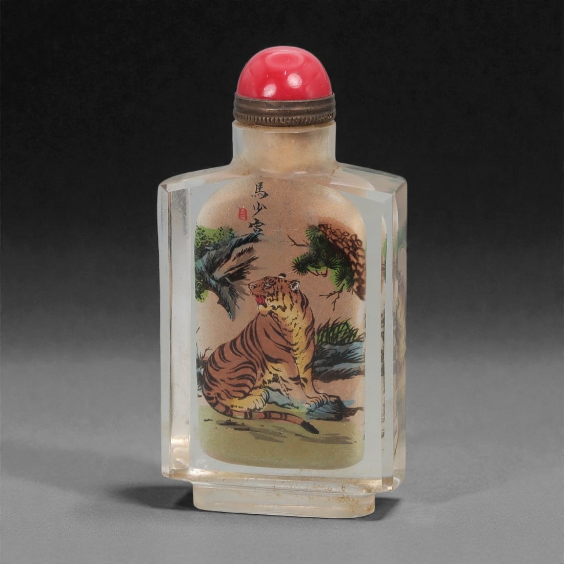 A Chinese Crystal Glass Inside-Painted Snuff Bottle, 20th Century, 64FG: The snuff bottle is formed from clear crystal glass and of flattened rectangular section, rising from a narrow foot to a short cylindrical neck with a flat rim. The interior is finely painted with a s
