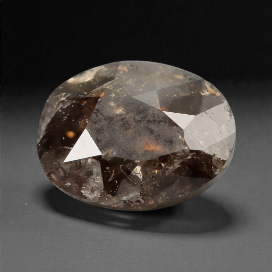 0.30 Carats Cognac Fancy Diamond - Natural African Stone, 4.6x3.5mm, 26A: This singular cognac fancy diamond radiates with a warm, ambered glow, evoking the rich tones of aged brandy and sunlit honey. Precision-cut in a classic brilliant shape, its facets catch light to rev