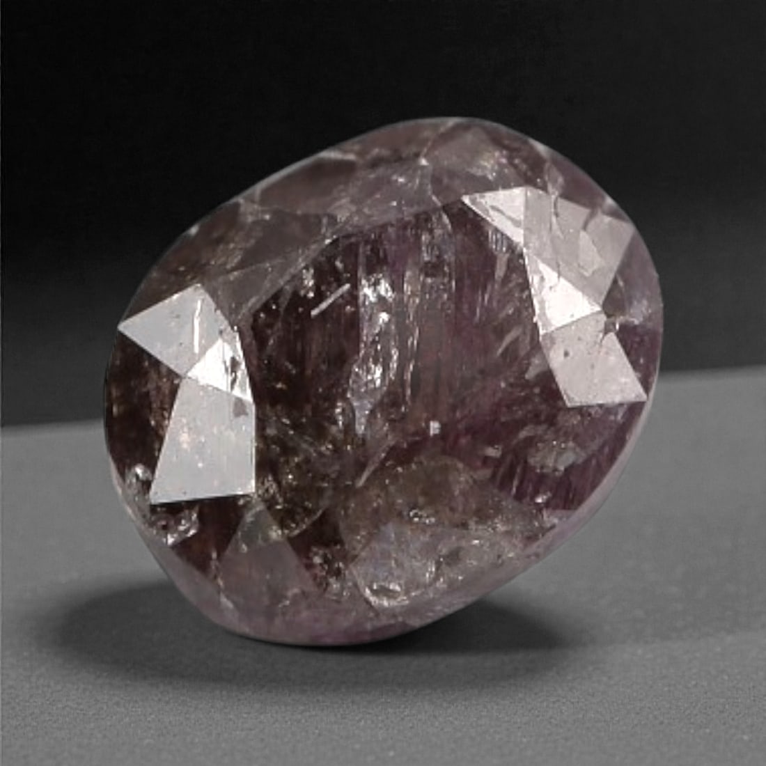 0.19 Carats Purplish Pink Diamond - Natural Argyle Mine, Australia, 91A: This singular purplish pink diamond from the Argyle mine is a rare and captivating gem, showcasing the distinctive, velvety hue that has made Australian pink diamonds among the most coveted in the wor