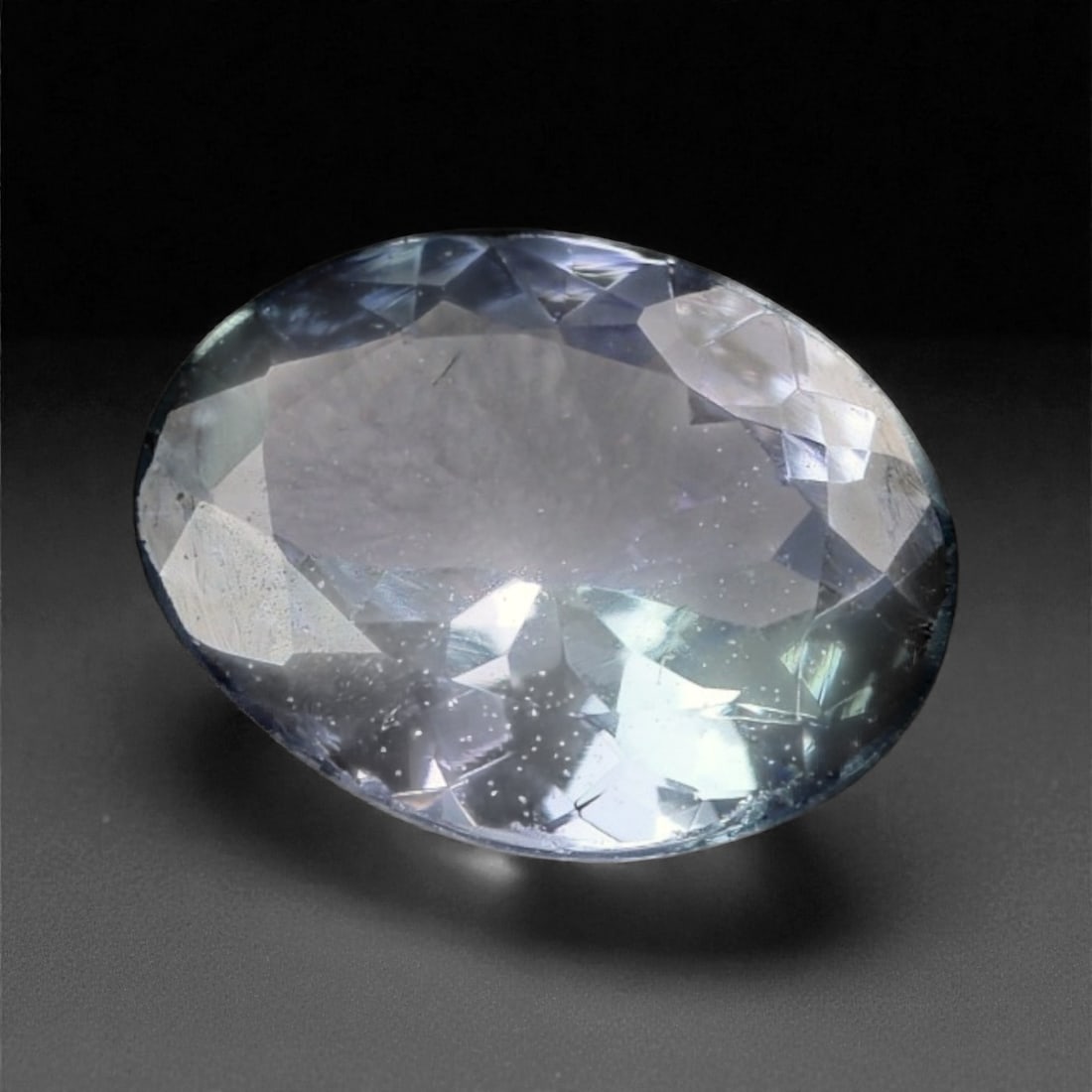 0.96 Carat Light Violet-Blue Tanzanite - Natural Tanzanian - 7.9 x 5.9 x 3.1 mm, 34XK: This softly toned tanzanite offers a delicate blend of light violet and icy blue, reflecting a tranquil elegance that's both ethereal and refined. The oval cut reveals a gentle internal shimmer, with