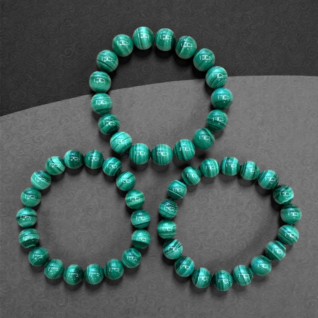 A Group of Three Malachite Beaded Bracelets, 130g, 77AA (1 of 1)