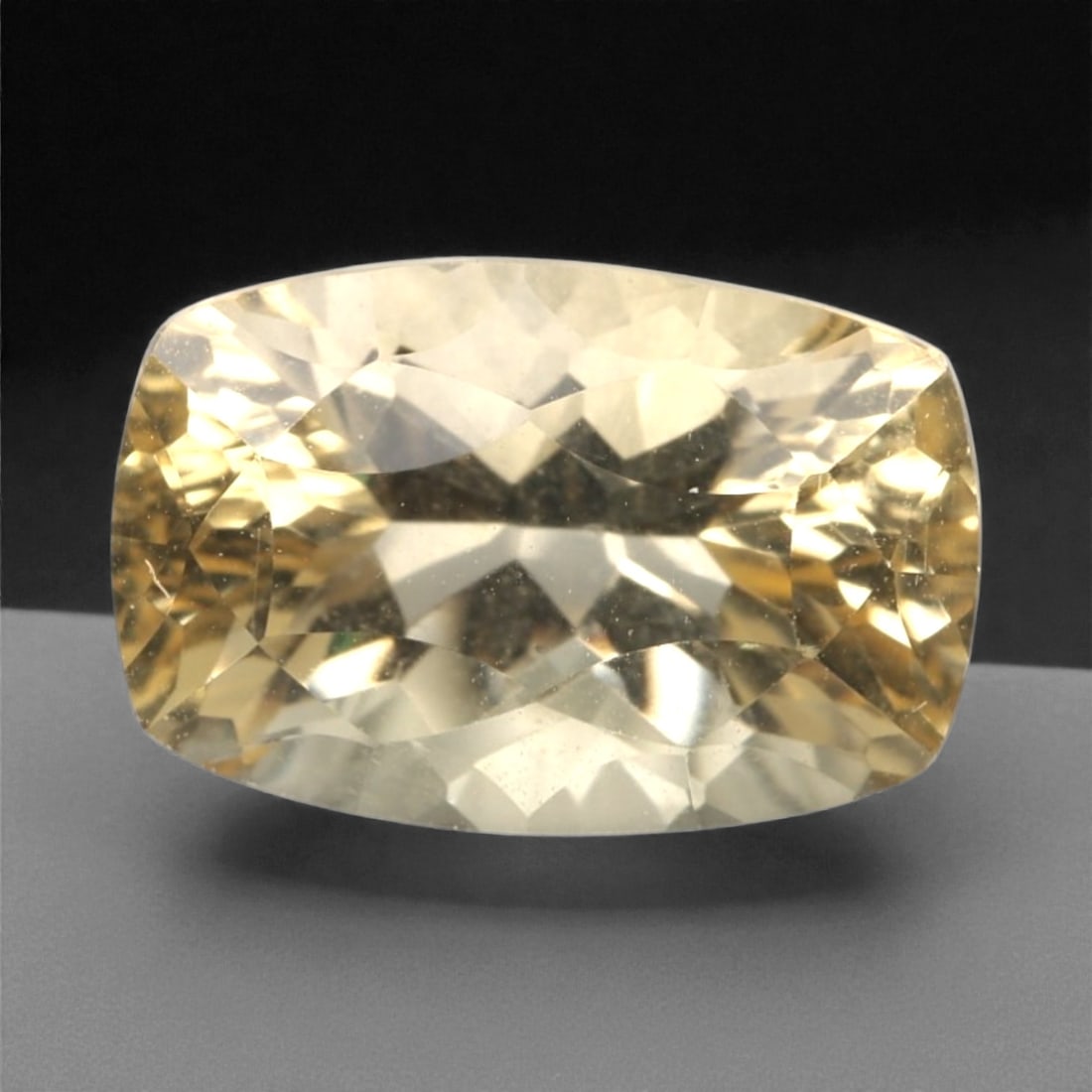 2.93 Carats Golden Yellow Citrine - Natural Brazilian Stone, 366A: This exceptional cushion-cut citrine gemstone captivates with a rich, honeyed golden-yellow hue, reminiscent of sunlit amber and liquid gold. The precision faceting maximizes light dispersion, creatin