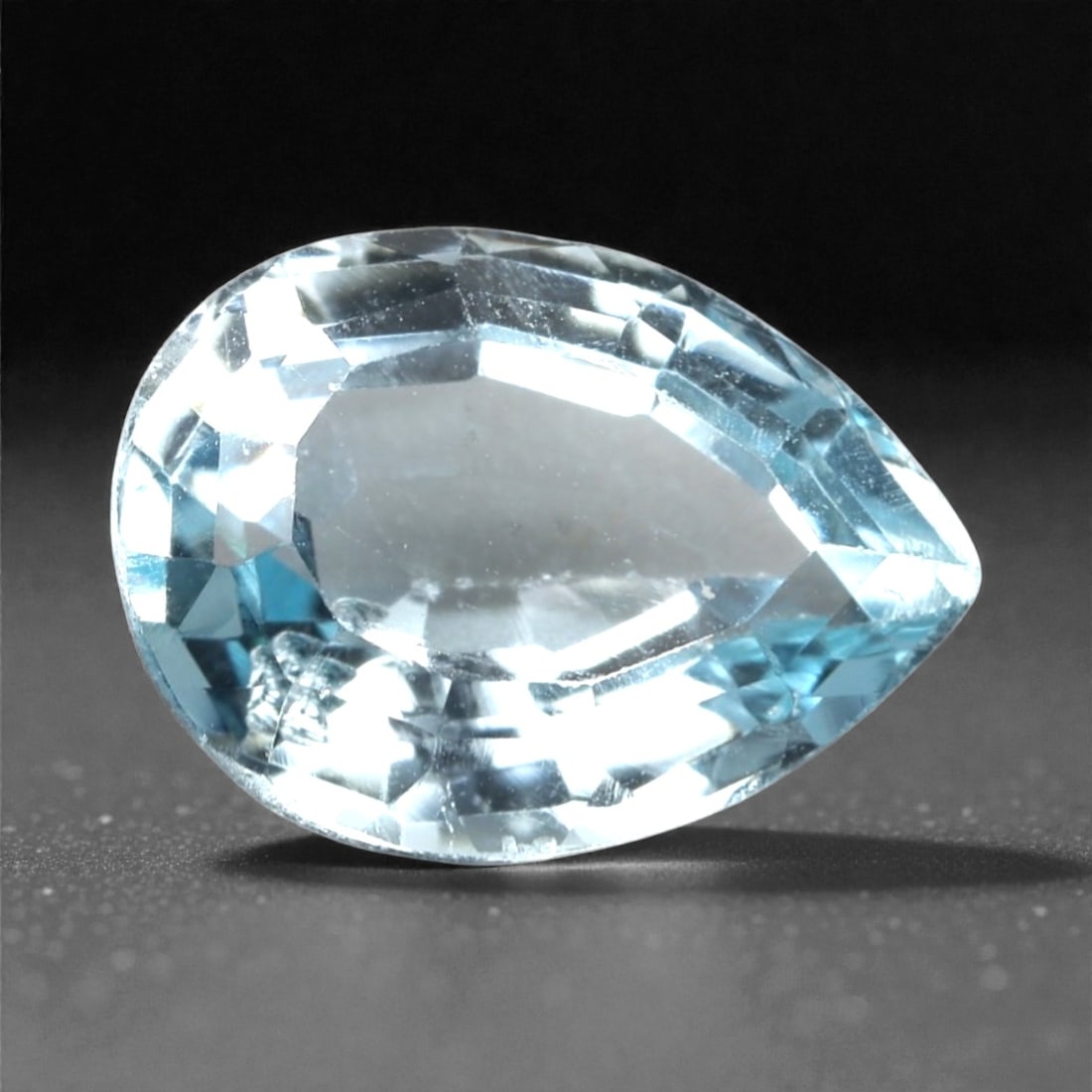 3.76 Carats Sky Blue Topaz - Natural Brazilian Stone, 373A: This exceptional pear-cut topaz gemstone captivates with a serene, sky-blue hue, reminiscent of clear tropical waters and open summer skies. The precision faceting maximizes light dispersion, creating