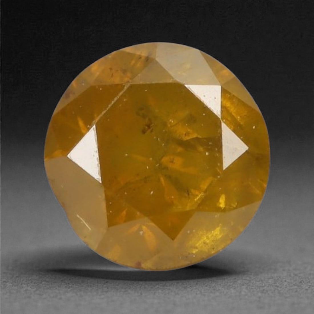 0.21 Carats Fancy Round Diamond - Natural African Stone, 3.7mm, 61A: Africa is renowned as a premier source for natural fancy colored diamonds, celebrated for producing stones with rich, earthy saturation and exceptional light performance. This fancy diamond exemplifie