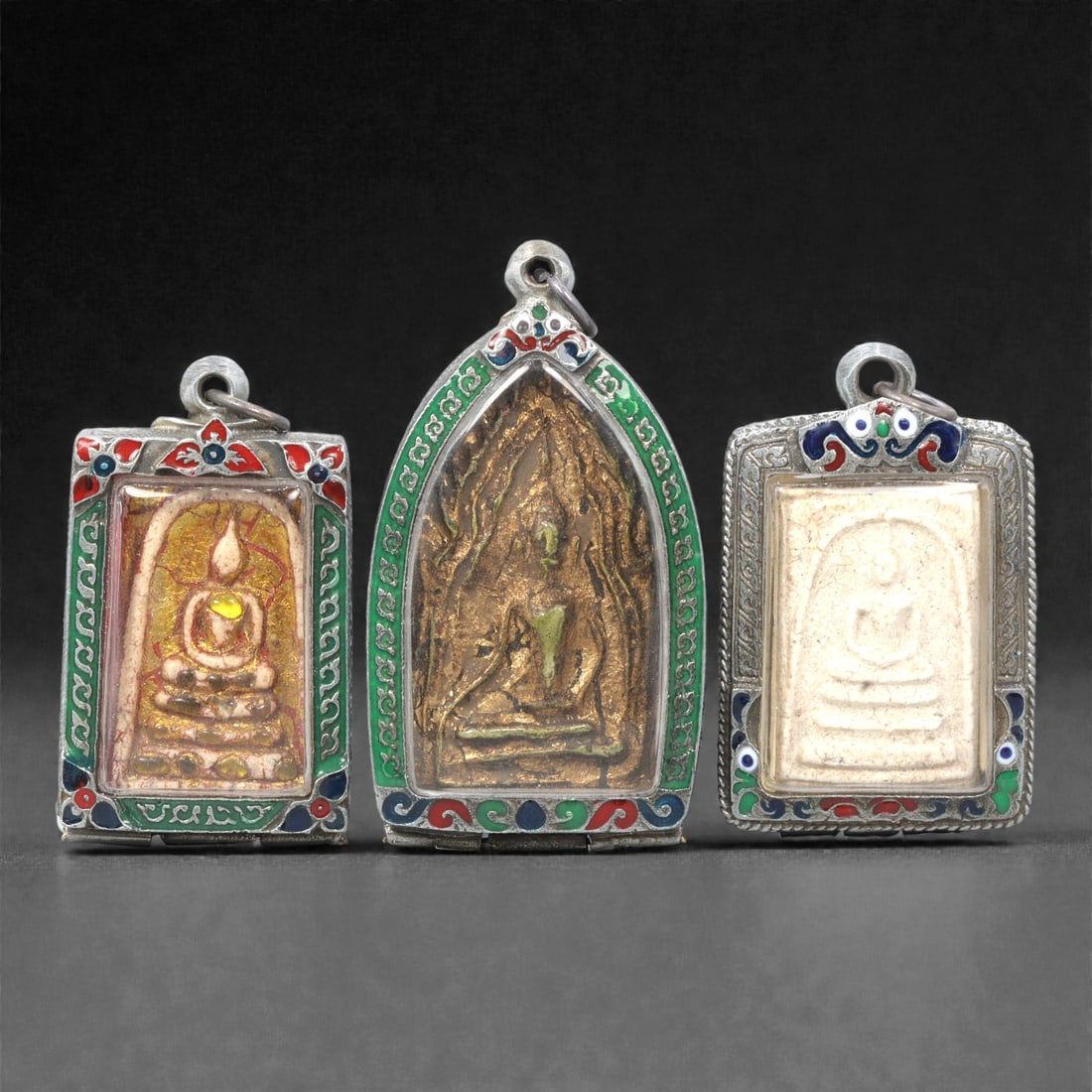 A Group of Thai Clay and Composite Buddhist Amulets, 20th Century, 20ZG (1 of 2)