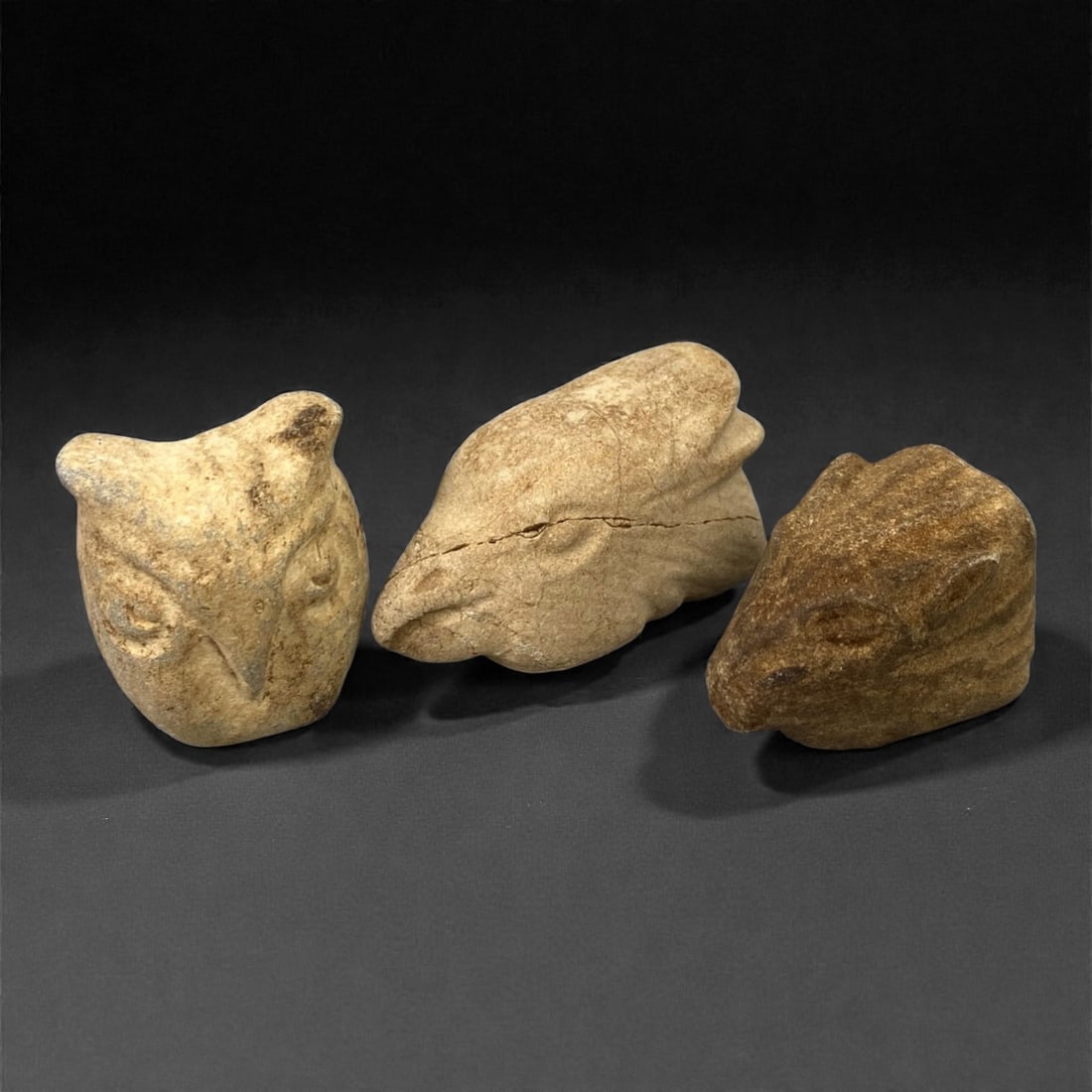 A Group of Three Ancient Near Eastern Zoomorphic Stone Heads, 2nd-1st Millennium BCE, 60FL (1 of 1)
