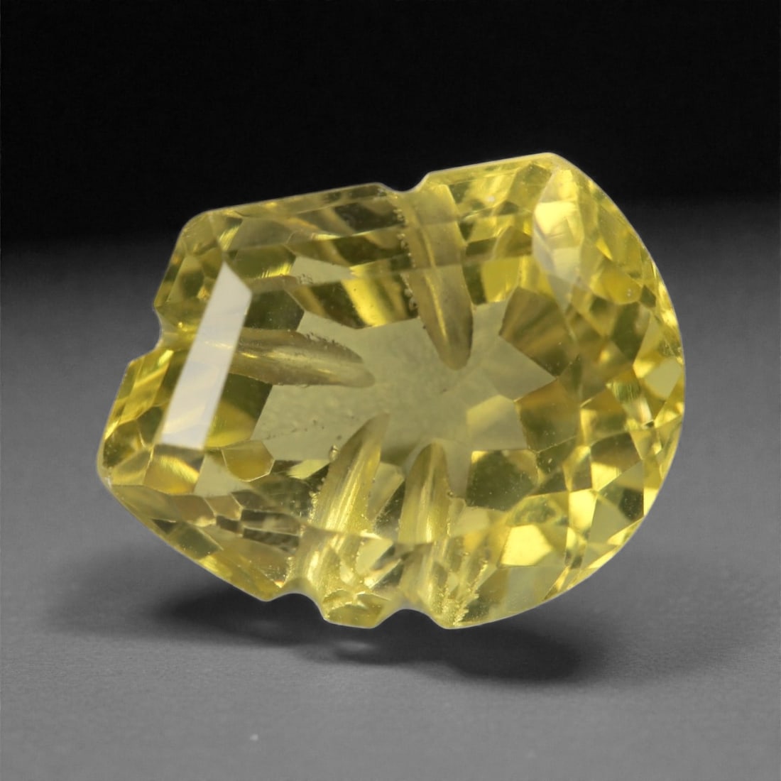 10.84 Carats Carved Lemon Quartz - Natural Brazilian Stone - 15.4 x 11.8 x 9.9 mm, 83WC: Bursting with vibrant clarity and citrus-bright color, this expertly carved lemon quartz radiates cheerful energy and refined craftsmanship. Its fantasy-style cut features intricate faceting and sculp