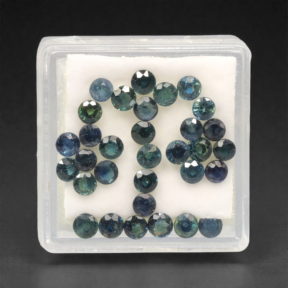 5.87 Carats Parti-Colored Sapphire Parcel - Natural Australian Stones, 49DB: This curated parcel of parti sapphires captivates with a dynamic interplay of deep blue, teal, and rich green hues, each stone exhibiting the distinctive color zoning that makes Australian sapphires h