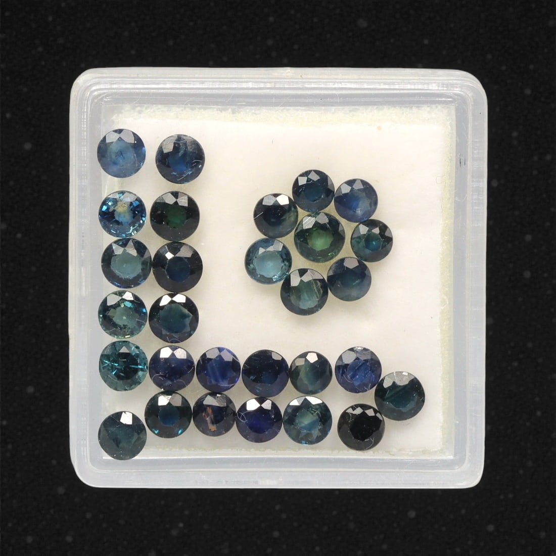 5.97 Carats Parti-Colored Sapphire Parcel - Natural Australian Stones, 48DB: This curated parcel of parti sapphires captivates with a dynamic interplay of deep blue, teal, and rich green hues, each stone exhibiting the distinctive color zoning that makes Australian sapphires h