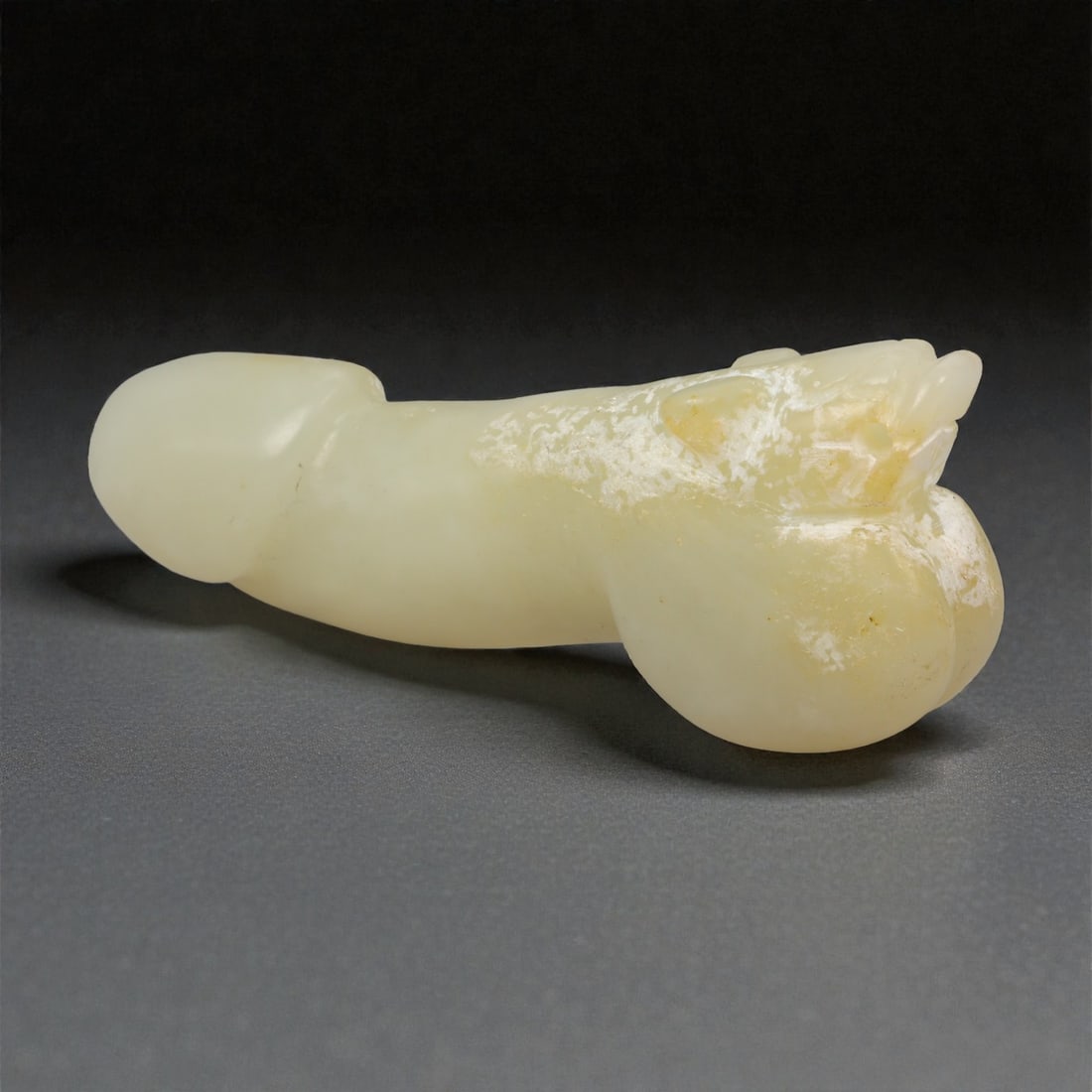 A Chinese Hetian Jade Phallic Amulet with Mythical Beast Terminal, 20th Century, 10YA (1 of 3)