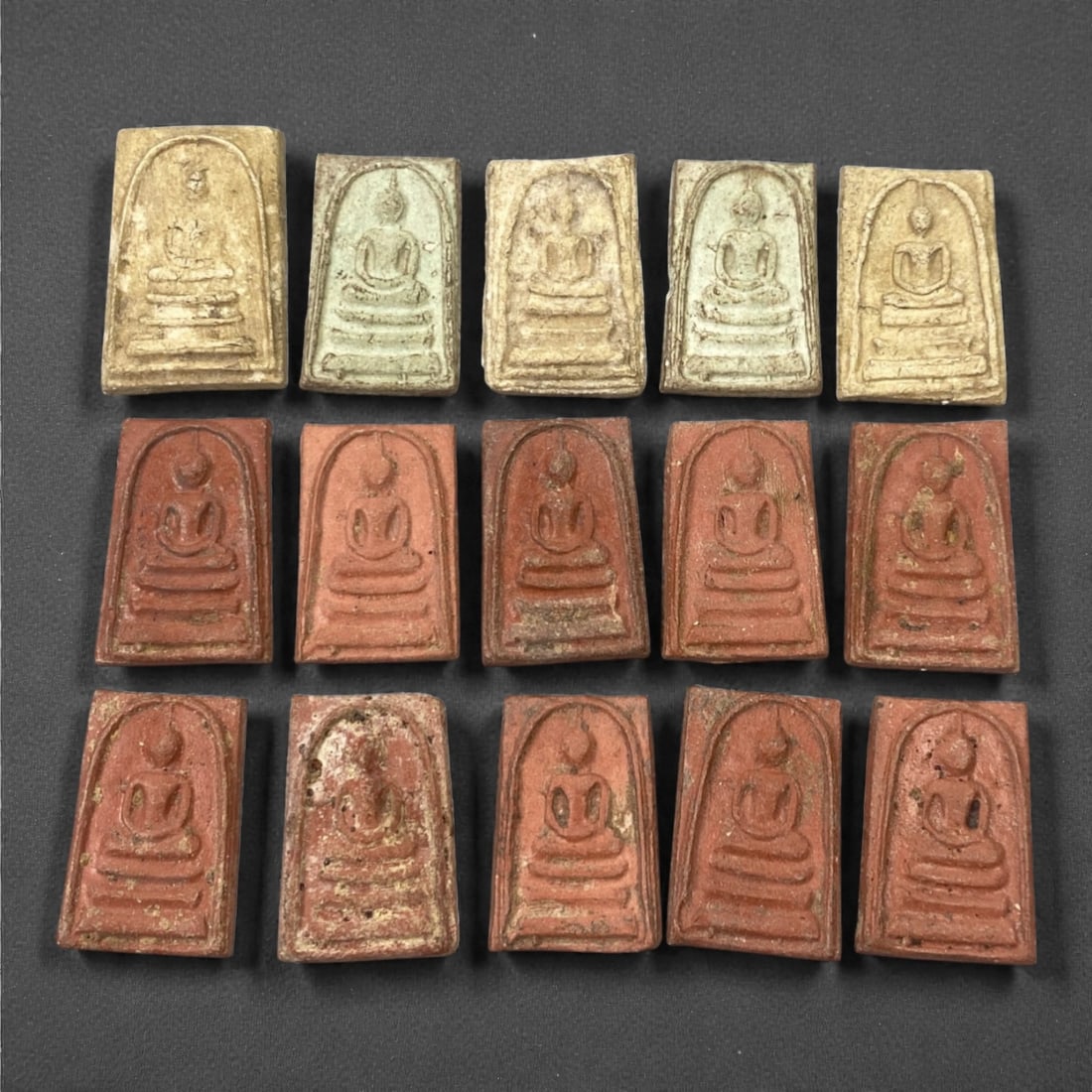 A Group of Thai Clay Buddhist Amulets, 20th Century, 78FK (1 of 1)