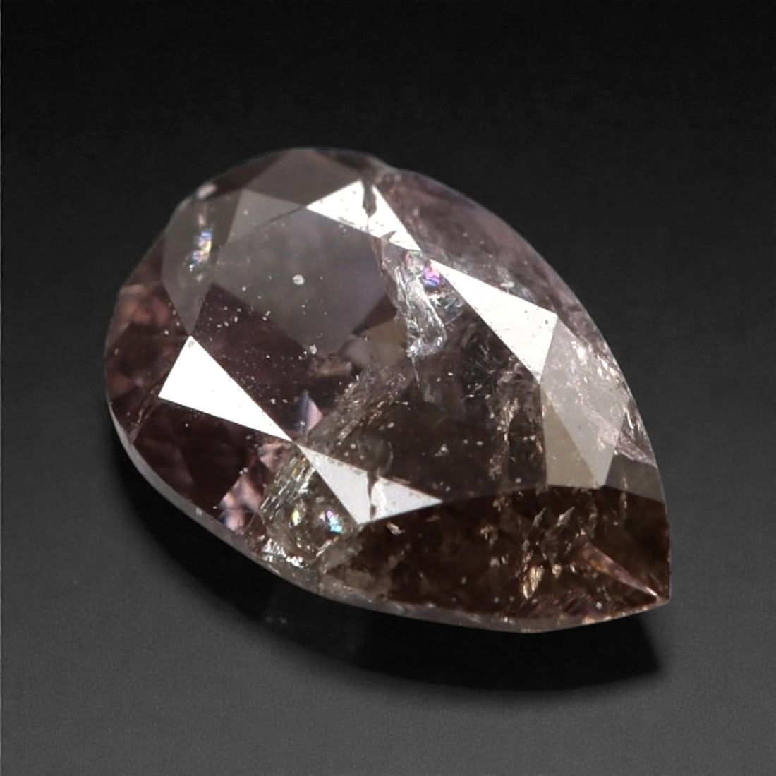 0.27 Carats Purplish Pink Diamond - Natural Argyle Mine, Australia, 115A: This singular purplish pink diamond from the Argyle mine is a rare and captivating gem, showcasing the distinctive, velvety hue that has made Australian pink diamonds among the most coveted in the wor