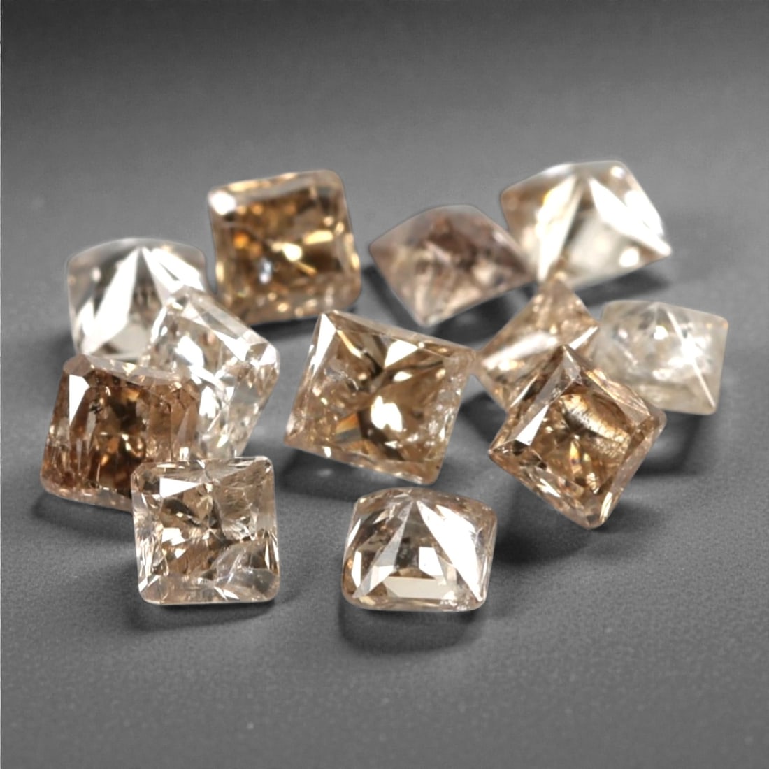 0.53ct 12 Pieces Champagne Diamond Parcel - Princess Cut, 218A: This elegant parcel of 12 loose champagne diamond gems captivates with a warm, honeyed hue that evokes the richness of aged champagne and the glow of liquid sunlight. Each stone is cut in a well-propo