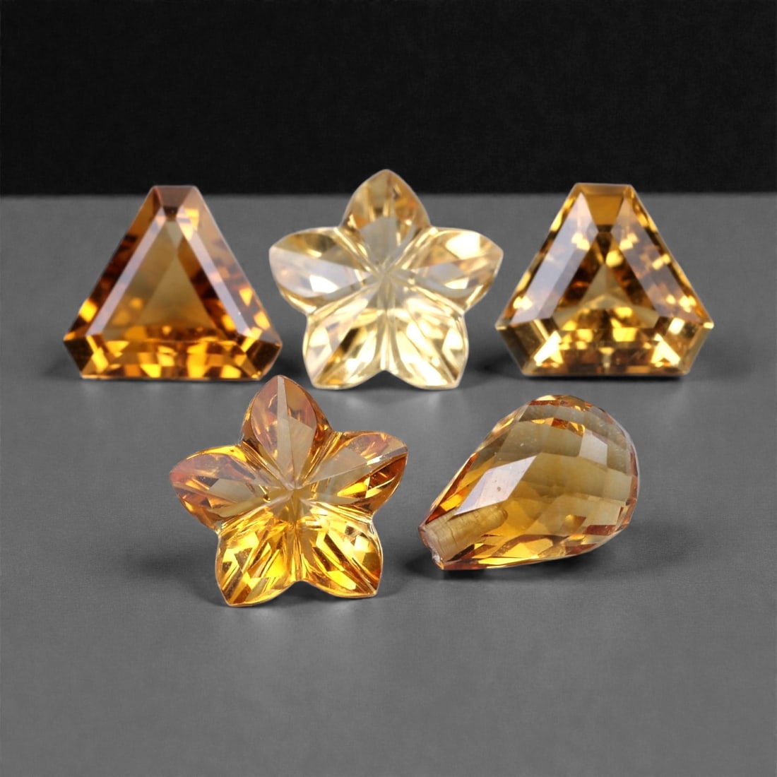 6.15 Carats Golden Citrine Selection - Natural Brazilian Stones 6-8mm, 77XH: A radiant ensemble of golden citrine gemstones, this selection glows with warm amber and honey tones that shift beautifully under light. The stones possess high brilliance, clean faceting, and a golde